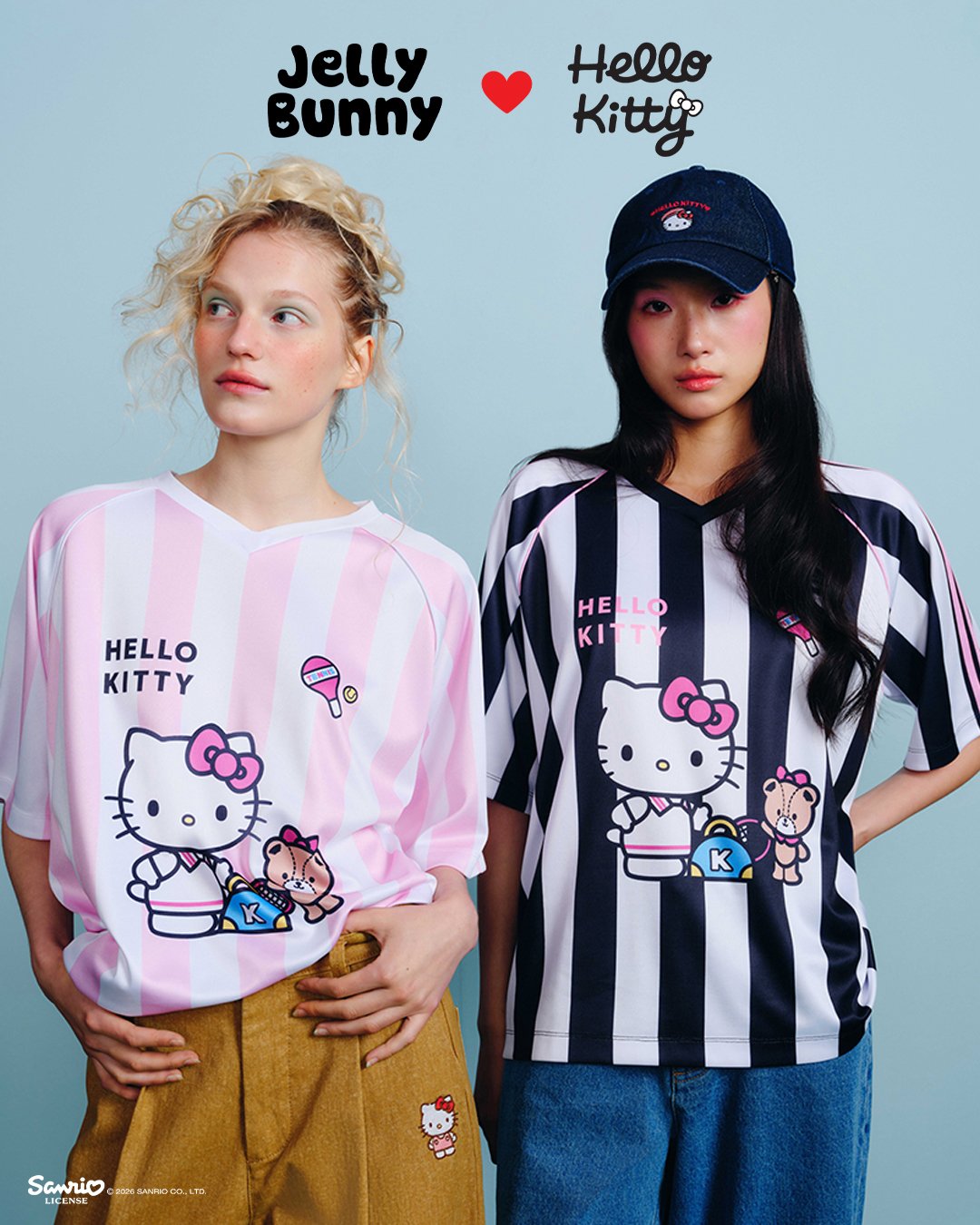 Two models wear pink-and-white and black-and-white striped Hello Kitty football-style jerseys from the Jelly Bunny collaboration