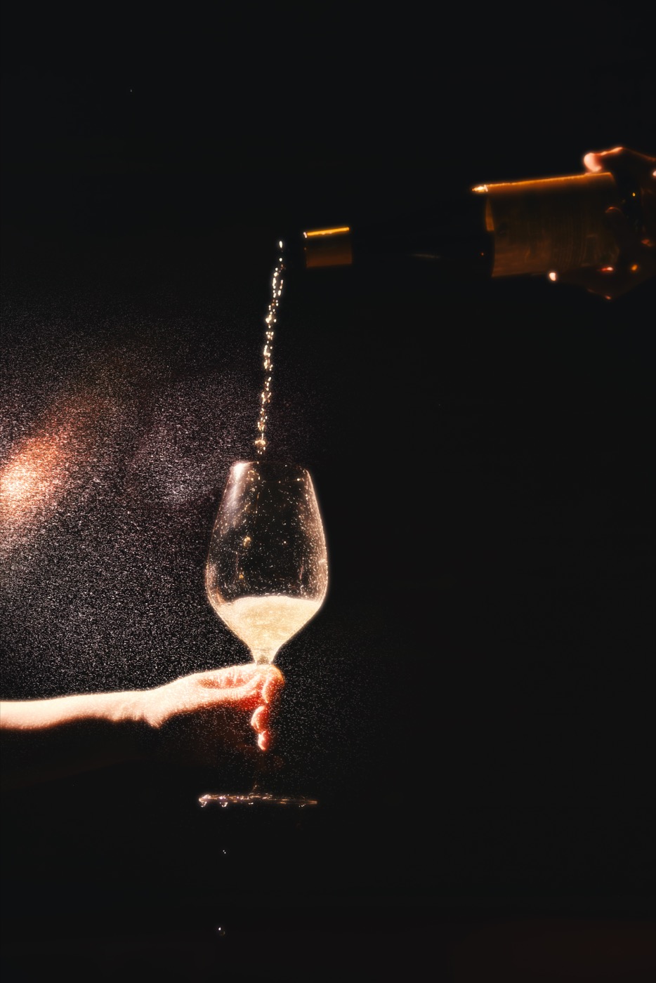 A glass of wine being poured at Sabato's, the Italian-American restaurant at Kimpton Naluria Kuala Lumpur