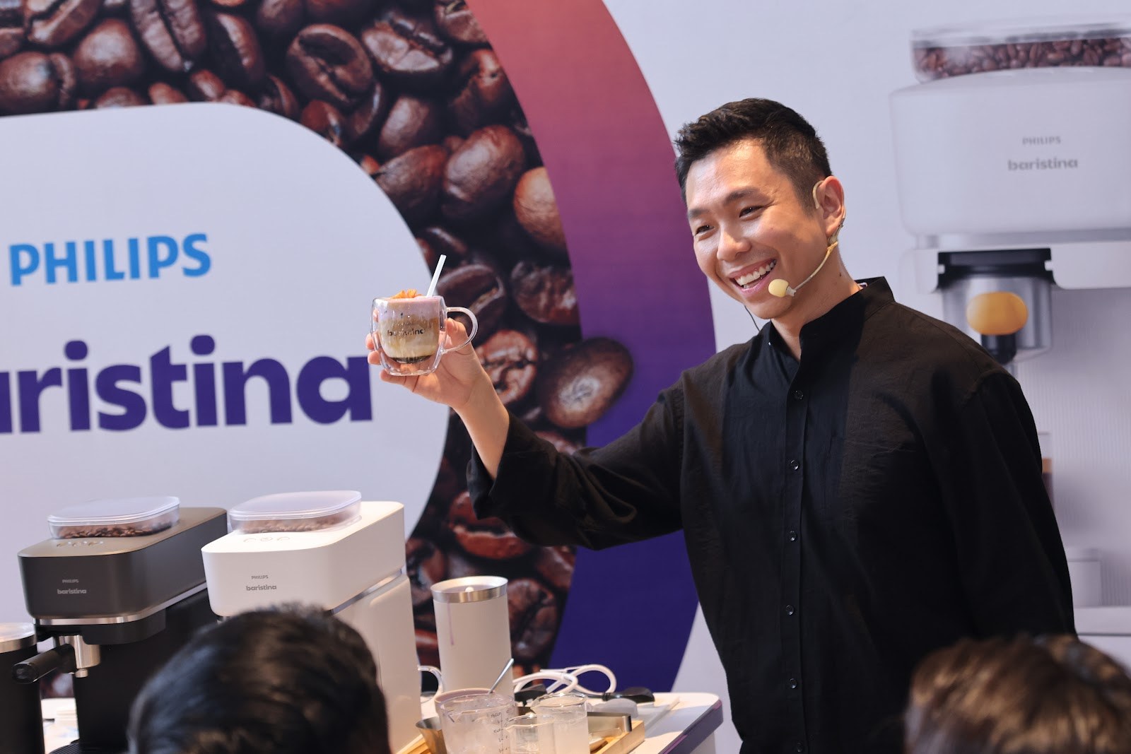Jason Loo with a Gula Melaka Ube Latte made using the Philips Baristina