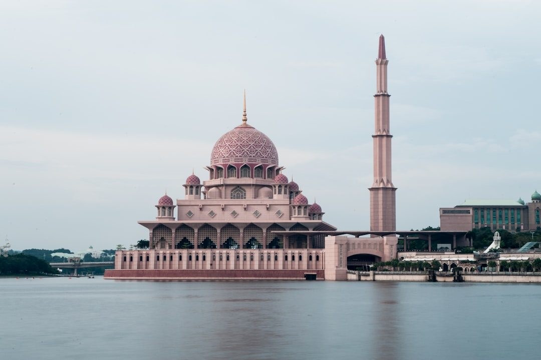 The pink-domed Putra Mosque beside the lake in Putrajaya